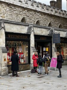 People standing in front of a bookshop