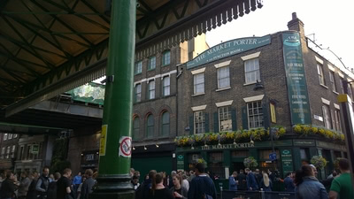 Borough Market pub The Market Porter viewed from the market entrance.