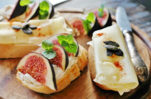Cheese and fresh figs served on a plate
